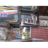 A world stamp collection on small to mid-sized stock cards and in old approval booklets