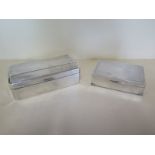 Two silver desk cigarette boxes, largest 17cm x 9cm x 5cm - both generally good