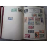 A world stamp collection in small, but dense album, with various stock-cards inserted