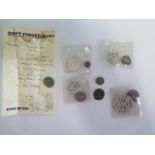 A collection of seven Roman coins