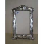 A large silver photo frame - 40cm x 26cm - Birmingham 1911/12 - general usage, some denting but