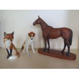 A Beswick figurine of the racehorse Arkle, approximately 30 cm tall together with two Royal