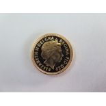 A 1998 Royal Mint Half Sovereign with presentation case and certificate