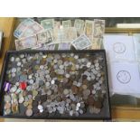 A collection of assorted world coinage and bank notes