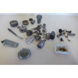 A collection of silver tops from bottles and walking sticks, watch bracelets approximately 1.2toz,