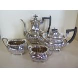 A silver four piece tea set - Walker and Hall, Sheffield 1900/01 - approx 65 troy oz - good clean