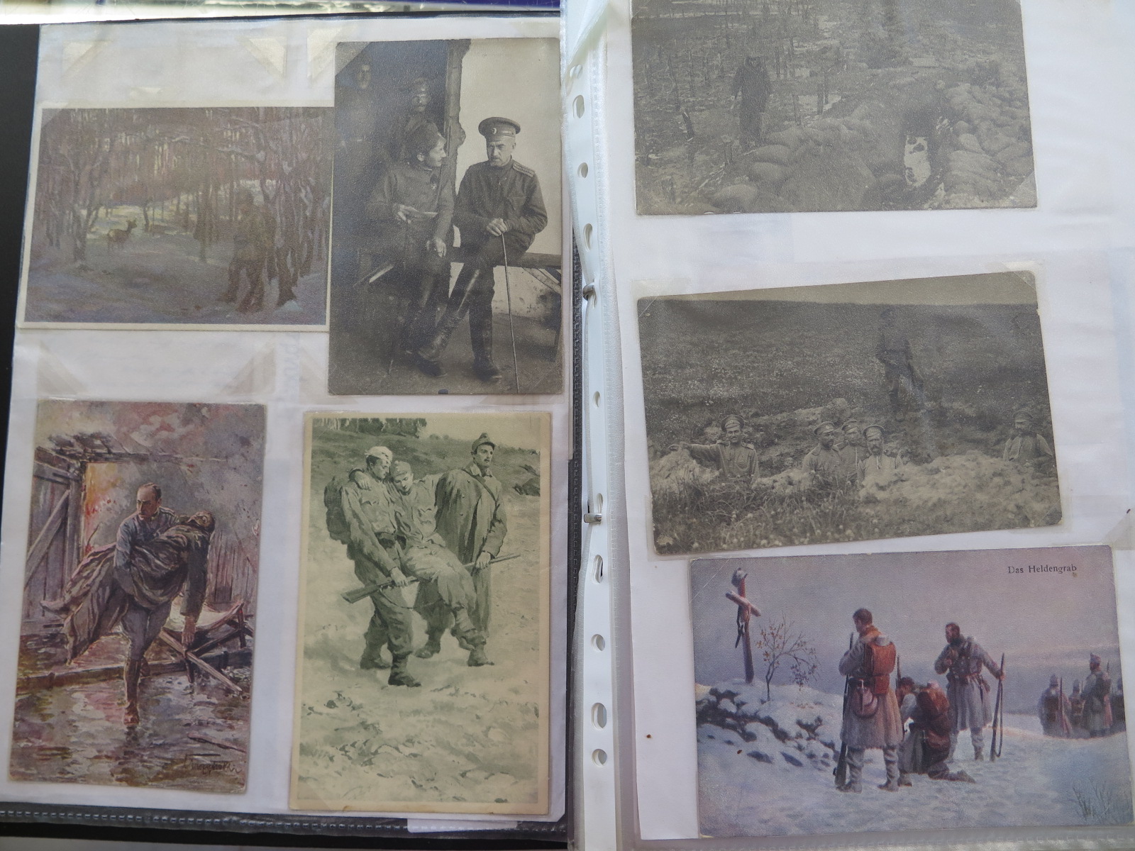 An album of approx 200 WWI postcards and cuttings