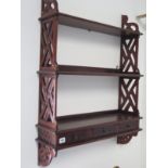 A Georgian style mahogany waterfall wall shelf with three small drawers, 90cm H x 66cm W x 19cm D