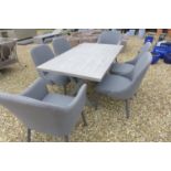 A Bramblecrest Monterey 155cm ceramic table with four side chairs and two armchairs in grey