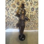 A bronze figure of a dancer - 98cm H