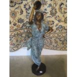 A bronze figure of a dancer - 98cm H