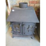 A two door wood burning stove - 82cm H x 60cm W x 40cm D