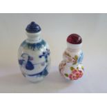 Two oriental snuff bottles - tallest 8cm