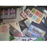 A sorter box of stamps with foreign and commonwealth material in a variety of small stock-books or