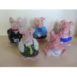 A complete set of five Wade NatWest Piggy banks, largest 19cm high, all with rubber stoppers,