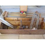 A vintage Jacques and Son croquet set with four croquet mallets, five hoops, seven boxwood balls,