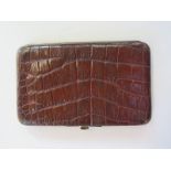 An early 1900s crocodile card case 15 cm x 9 cm in good clean condition some minor wear