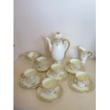 A Royal Doulton gilt decorated coffee set, in good condition