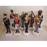 A set of 8 Michael Sutty fine bone china Artillery figures, Drum Major 1840 - number 188 or 250 -