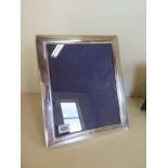 A large silver Carr's photo frame, 31cm x 26cm, minor dent, otherwise good