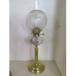 A brass oil lamp with cut glass font and etched shade - 68cm - good clean condition