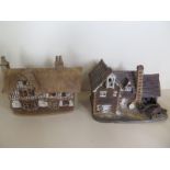 A well modelled studio stoneware pottery model of a Tudor house, together with a stoneware model