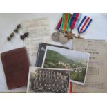 Four WWII medals with emphemera, pay book to 3863616 Harry Ramsden and assorted ration books etc