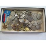 A collection of assorted coinage including commemorative crowns and two unnamed WWII medals