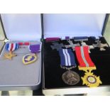 A collection of 11 US and British medals, with presentation cases, see images for details and