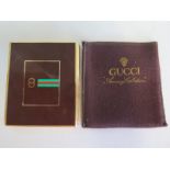A Gucci Accessory Collection cigarette case and cover, some usage marks, generally good