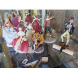 Nine Royal Doulton figurines including two Prestige figures of Nelson and Guido Fawkes, both with