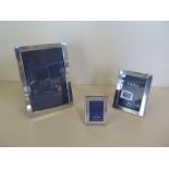 Three silver photo frames, largest 17cm x 12cm, all good, some small usage marks