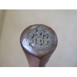 A Royal Flying Corps stick, believed to be made from part of old plane, has RIF.C Badge in end -