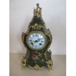 A French clock, case decorated with flowers, the dial with Roman numerals, 7 day movement - 34cm H -