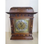 A nice quality bracket clock by W and H, oak case, brass dial, silver chapter ring, chimes