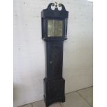 An oak 8 day striking longcase clock with a 12 inch square brass dial signed Hewett Malboro, the