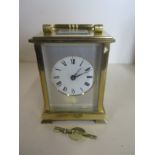 A Shortland Bowen brass carriage clock, with commemorative decoration - 13cm tall, running in