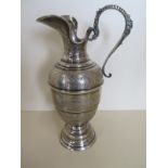 An Egyptian silver ewer jug, 29cm tall, approx 17 troy oz - some denting to spout, otherwise