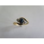 An 18ct gold sapphire and diamond ring - size K - approx 2.2 grams - some abrasions but generally
