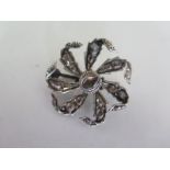 A 19th Century old cut diamond and white metal floral brooch, 35mm wide, approx weight 11 grams, old