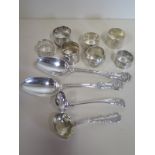 A collection of silver items including two large Victorian silver tablespoons, a small Scottish