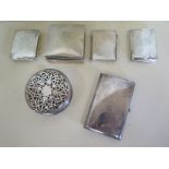 Four silver cigarette cases, a silver cigar and cigarette case, and a silver pot pourri, silver