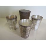 Three silver flasks marked silver B100 approx 7.9 troy oz - in a leather case, please see images for