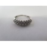 A silver diamond ring, approx .25ct, with report - size P/Q - approx 2.2 grams - in good condition