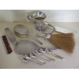 Six HM silver teaspoons, approximately 3.5toz together with a silver handled brush, four silver