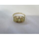 A 9ct opal ring in yellow gold - size N - approx 2.3 grams - in good condition