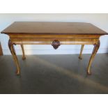 A Continental serving table on cabriolle legs, measuring 158cm W x 69cm D x 87cm H