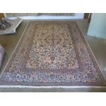 A hand knotted Kashan woollen rug - 3.02m x 2.04m