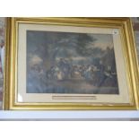 A coloured lithograph entitled - An English Merry Making in the Olden Time - in a gilt frame,