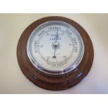 A mahogany case anoroid barometer 6 inch silvered dial, chrome bezel